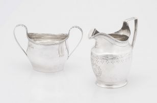 A George III silver milk jug, maker's mark indistinct, London, 1800