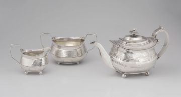 A George III silver assembled three-piece tea set, Thomas Wallis & Jonathan Hayne, London, 1812