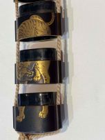 A Japanese black and gold lacquer five-case inro, 19th century