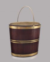 A George III brass-bound mahogany peat bucket