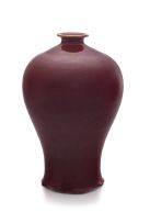 A Chinese red-glazed vase, Meiping, Qing Dynasty, 19th century