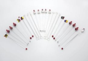 A miscellaneous group of twenty-three glass cocktail glass sticks, mid 20th century