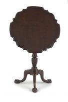 A George III style mahogany tilt-top pie crust table