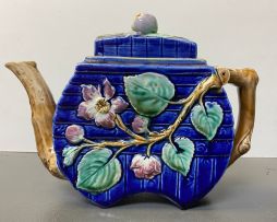 A Staffordshire blue, green, brown and purple crabstock teapot, late 19th/early 20th century