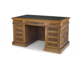 A Flemish oak pedestal desk