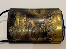 A Japanese black and gold lacquer four-case inro, 19th century