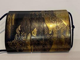 A Japanese black and gold lacquer four-case inro, 19th century