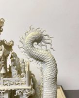 A Chinese biscuit porcelain model of a dragon boat, Qing Dynasty, late 19th century