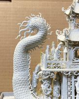 A Chinese biscuit porcelain model of a dragon boat, Qing Dynasty, late 19th century