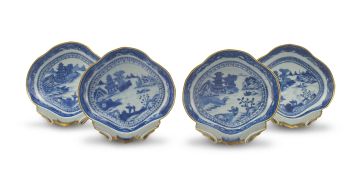 A set of four Chinese Export blue and white shell-shaped dishes, Qianlong period, 1735-1796