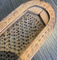 A treen fruitwood nutmeg grater, 19th century