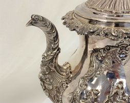 A George IV silver hot water jug, Hyam Hyams, London, 1828