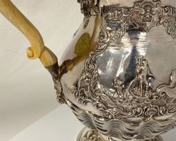 A George IV silver hot water jug, Hyam Hyams, London, 1828