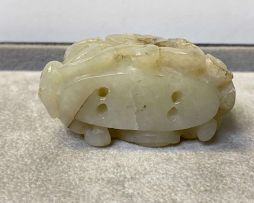 A Chinese celadon jade carving, Qing Dynasty, 19th century