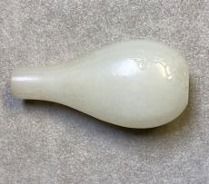 A Chinese pale celadon jade snuff bottle, Qing Dynasty, 19th century