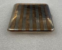 A George V silver and gold inlaid cigarette case, Sampson Mordan & Co, London, 1913