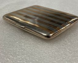 A George V silver and gold inlaid cigarette case, Sampson Mordan & Co, London, 1913