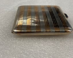 A George V silver and gold inlaid cigarette case, Sampson Mordan & Co, London, 1913