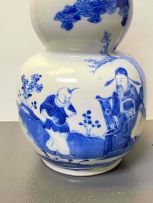 A Chinese blue and white double gourd vase, Qing Dynasty, late 19th century