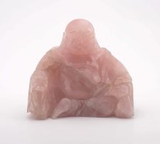 A Chinese pink quartz figure of Buddha