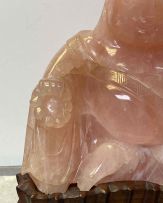 A Chinese pink quartz figure of Buddha