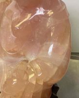 A Chinese pink quartz figure of Buddha