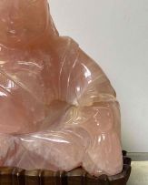 A Chinese pink quartz figure of Buddha