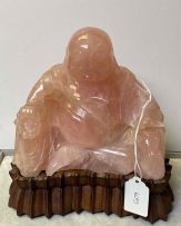 A Chinese pink quartz figure of Buddha