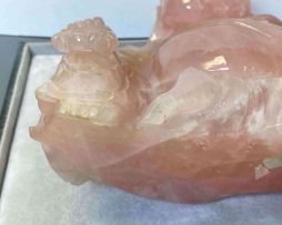 A Chinese pink quartz figure of Buddha