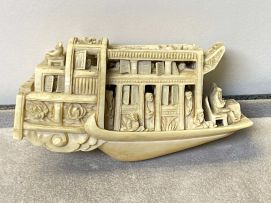 A Chinese pierced and carved ivory pleasure boat, 20th century