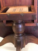 A Colonial mahogany and rosewood tilt-top centre table, late 19th century