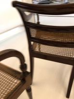 A set of four Colonial mahogany armchairs, late 19th century