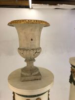 A pair of painted wooden pedestals