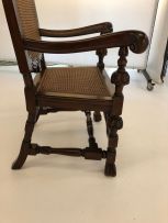 A Flemish style mahogany and caned armchair, 20th century