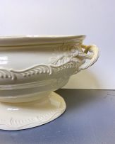 A creamware soup tureen, cover and stand, late 18th century
