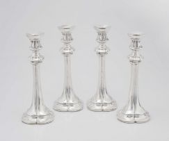 A set of four South African silver candlesticks, S.A.G, mid 20th century