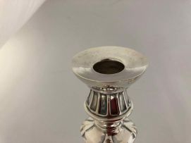 A set of four South African silver candlesticks, S.A.G, mid 20th century