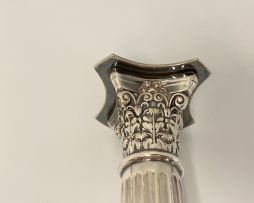 A pair of electroplated Corinthian silver candlesticks, 20th century