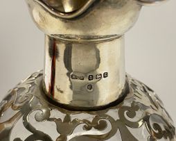 An Edward VII silver-mounted 'Kluk Kluk' glass decanter and stopper, Henry Clifford Davis, Birmingham, 1906 with Swedish date mark for 1907