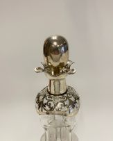 An Edward VII silver-mounted 'Kluk Kluk' glass decanter and stopper, Henry Clifford Davis, Birmingham, 1906 with Swedish date mark for 1907