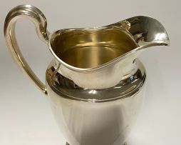 A pair of Tiffany & Co silver water pitchers, 1947-1956, .925 sterling