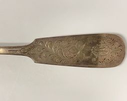 A German silver soup ladle retailed by Muller Chemnitz, .800 sterling