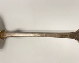 A German silver soup ladle retailed by Muller Chemnitz, .800 sterling