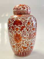 A Chinese iron-red enamelled vase and cover, Qing Dynasty, late 19th century