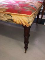 A needlework and mahogany stool