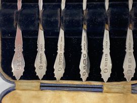A set of six Elizabeth II silver commemorative teaspoons, Henry Clifford Davis, various towns, 1952 - 1953 retailed by Michauds, East London