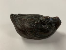 A Japanese patinated pewter study of a swan, Meiji period, 1868-1912