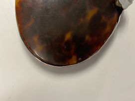 A tortoiseshell and silver-mounted magnifying glass, 19th century