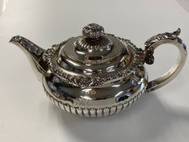 A George IV silver three-piece tea service, Thomas & George Hayter, London, 1822 - 1823