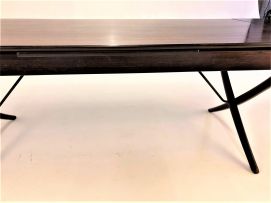 A Danish rosewood crossbanded draw-leaf dining table designed by Hans Wegner